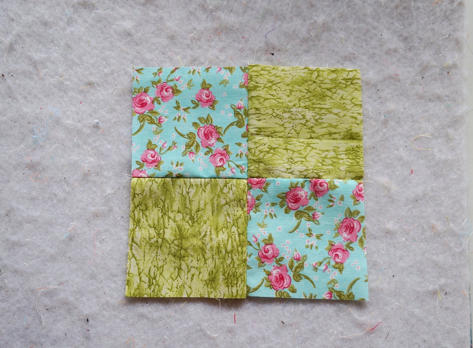 Four patch block quilting