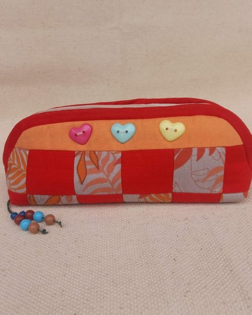 Estojo coral com vermelho